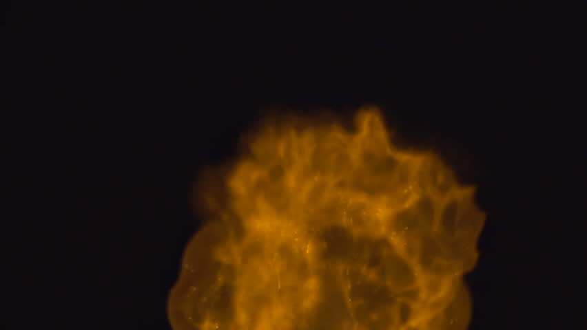 Close slow motion shot of a strange gaseous cloud of burning flames rolling