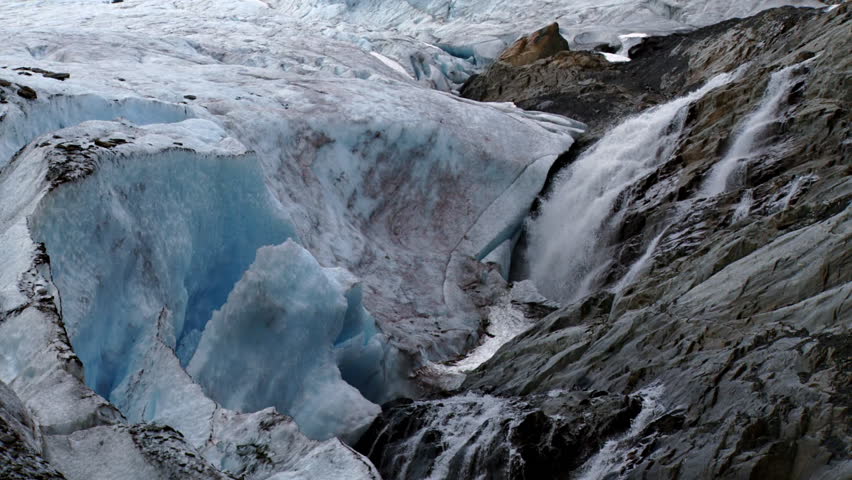Small waterfall near the nose of the Worthington Glacier, rushing from the