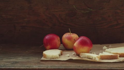 Red apples on vintage wood background