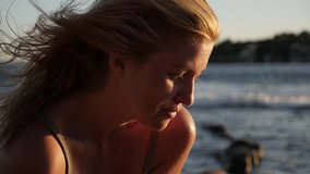 Enjoying in sunset on French coast slow motion 1920X1080 HD footage - Blonde Caucasian woman on the beach slow-mo 1080p FullHD video