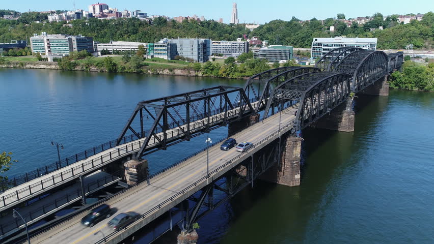 A slowly moving forward aerial view of the Hot Metal Bridge over the Monongahela River on Pittsburgh