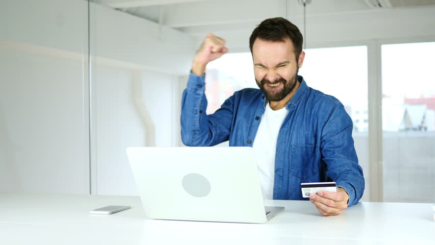 Happy Man Celebrating Successful Online Shopping, Credit Card Payment | Shutterstock HD Video #31125907