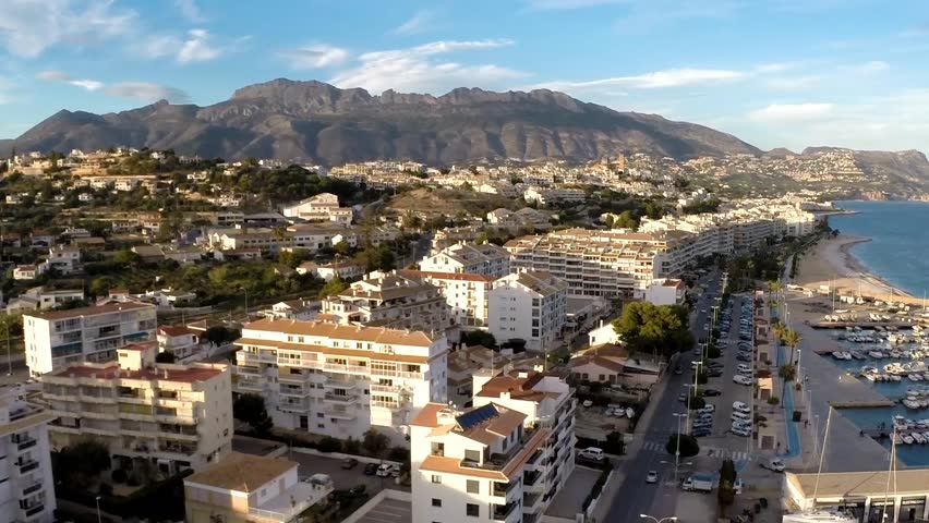 Spanish coast line - Altea, Alicante province. Coastline of Mediterranean sea with church, beach, marina, boats and hotels