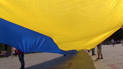 Novomirgorod, Ukraine - August 24, 2017:The people are long flag of Ukraine on a holiday Independence Day