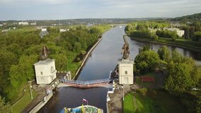 4K high quality aerial video footage of partly submerged Nikolskiy/St. Nicholas cathedral bell tower off the shore Kalyazin town on great Volga river, Golden Ring route 200 km from Moscow, Russia
