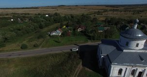 4K high quality aerial video footage of historical old Kabanskoye selo white washed stone church off road near Pereslavl-Zalesski town on Golden Ring route, north-eastern Russia, 160 km from Moscow