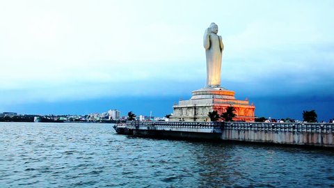 Tracking shot of a statue of Lord Buddha, Hussain Sagar Lake, Hyderabad, Andhra Pradesh, India