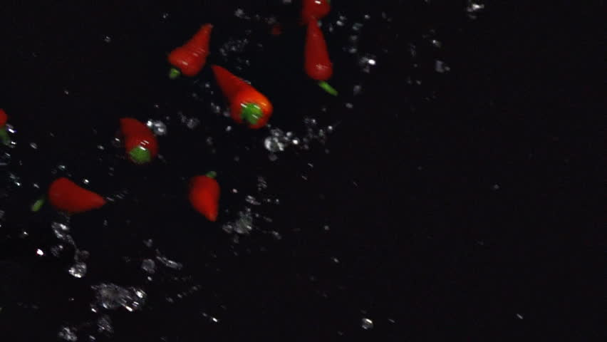 Peppers Flying Left to Right with Splash