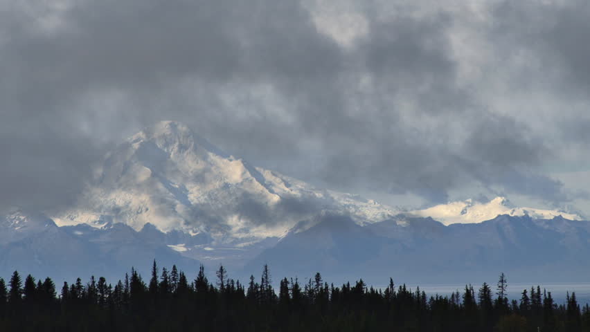 Mt Illiamna Shrouded by Clouds forest silhouette