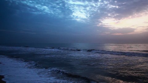 Pan shot of an ocean at sunset, Mahabalipuram, Kanchipuram District, Tamil Nadu, India