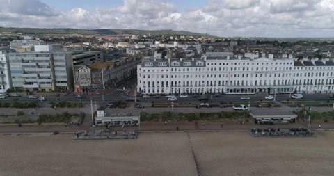 Aerial dolly view of the seafront of the town of Eastbourne, Southern England