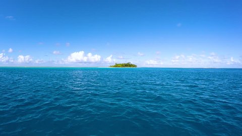 filmed island of a boat in french polynesia, tahiti