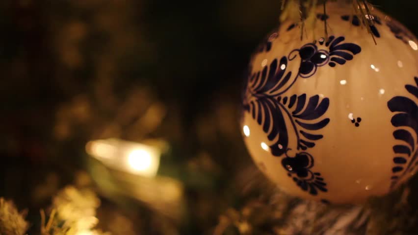Close up shots of ornaments on a Christmas tree