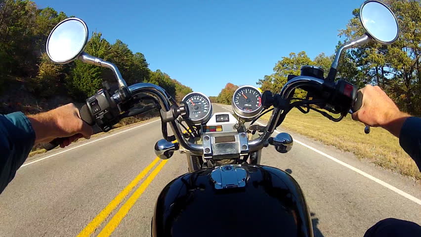 The point of view of a motorcycle rider on a rural road in South Eastern