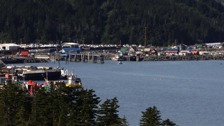 Whittier Alaska - Long Shot of Harbor and Town with Kayakers