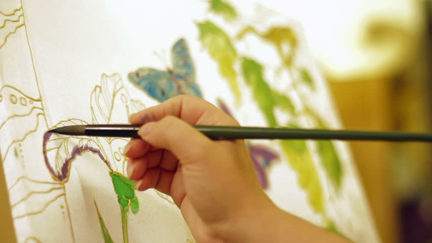 Person Painting an Image Using Stock Footage Video (100% Royalty-free