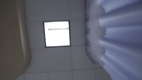 Tracking video shooting of the ceiling of a Hospital and cubicle curtains