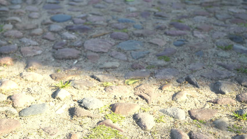 combat boots tugging chain prison concept