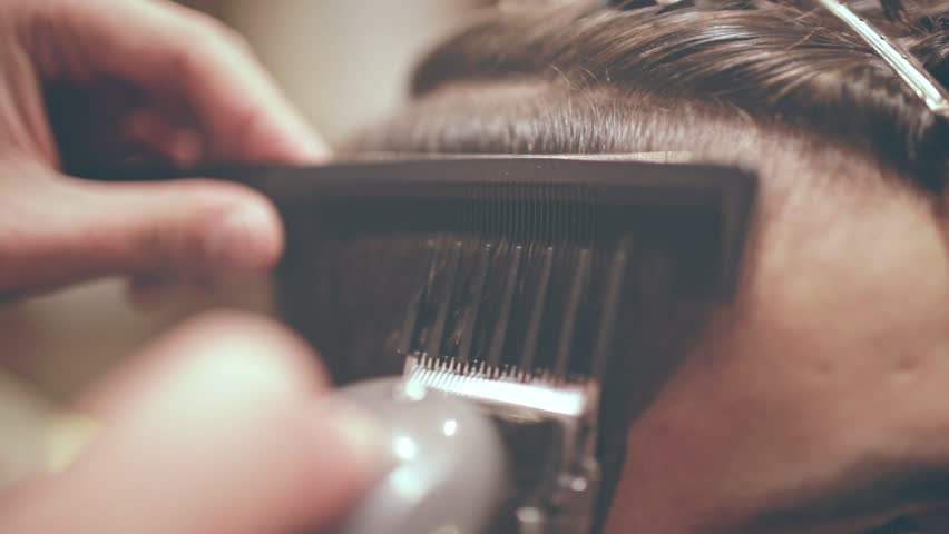 using electric razor to cut hair