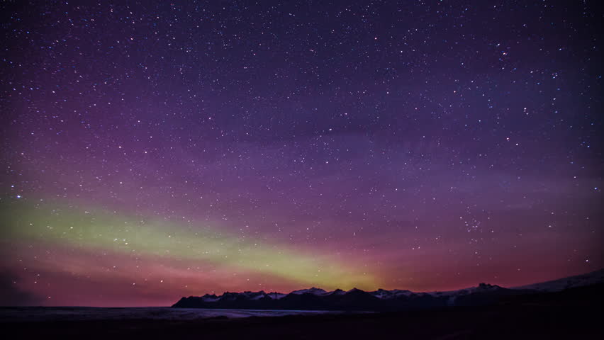 Time Lapse - Green and Pink Colored Northern Lights over the Mountains | Shutterstock HD Video #31185331