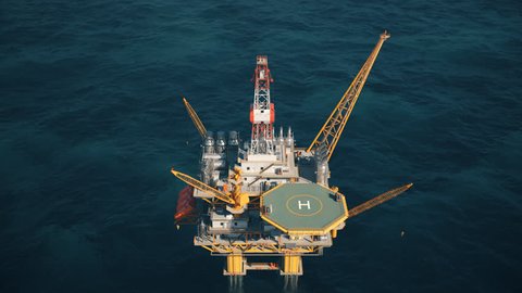 02926 Aerial view of the offshore drilling oil rig in the middle of the sea.