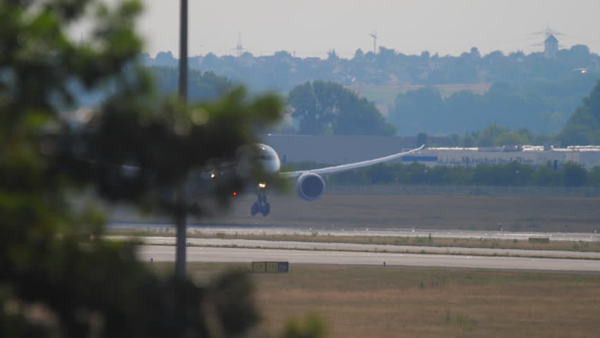 FRANKFURT AM MAIN, GERMANY - JULY 18, 2017: LATAM Airlines Boeing 787 CC-BGE landing on runway 07L. Fraport, Frankfurt, Germany Royalty-Free Stock Footage #31194427