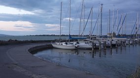 Pier with Boats on Balaton Lake in the Evening, Hungary. 4K Ultra HD 3840x2160 Video Clip