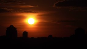 Timelapse of Huge Red Sunset above the City. 4K Ultra HD 3840x2160 Video Clip