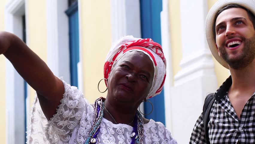 Baiana showing the city for tourist, in Salvador, Bahia, Brazil