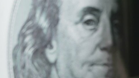 Benjamin Franklin on a 100 dollar bill.  Macro view. Full HD video