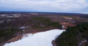 4K Flying above a forest in winter 5