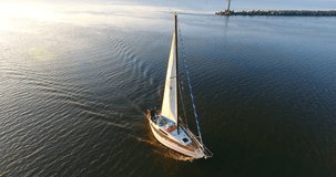 Aerial shot of yacht sailing on lagoon. Sailing boat. Yacht from drone. Yachting video. Yacht from above. Sailboat from drone. Sailing video - 003