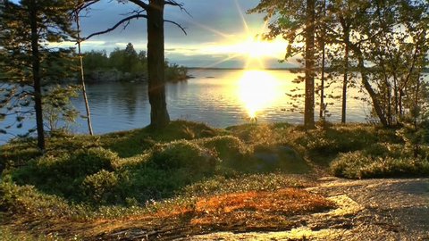 midnight sun at lake inari in finland, scandinavia, europe