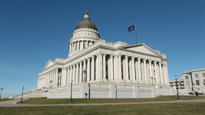 Utah State Capital building SLC. Utah State capitol building high on a hill overlooking the city of Salt Lake City. Elegant architectural interior design made from granite and copper outer dome.