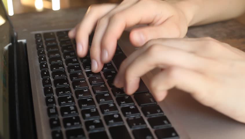Typing on laptop keyboard (HD)