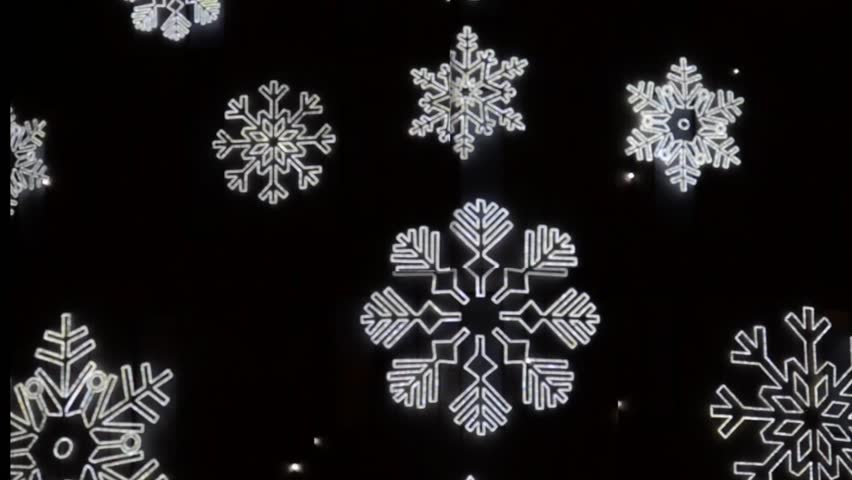 Abstract snow flakes on black background