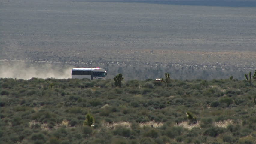 The White Bus Traveling on Groom Lake Road