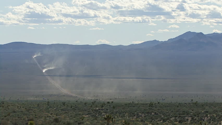 The White Bus Traveling on Groom Lake Road