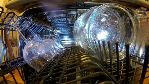 Time lapse . inside view on washing of ware in the dishwasher