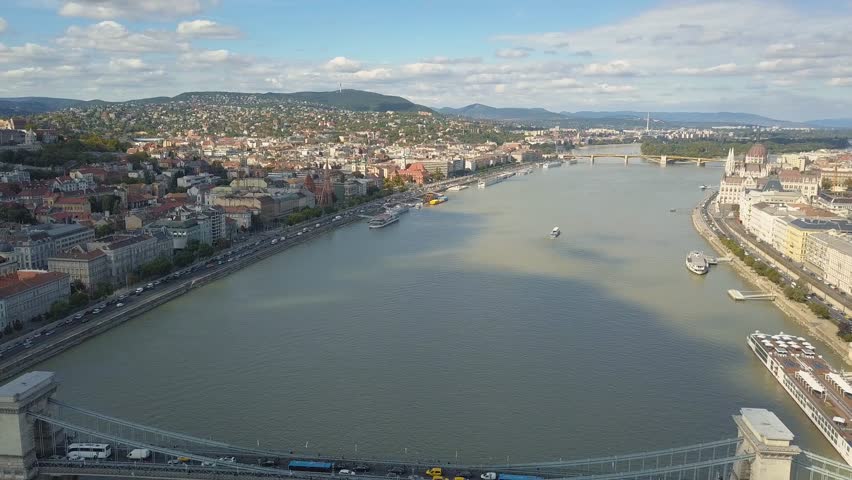 Aerial footage from a drone shows the historical Buda Castle near the Danube on Castle Hill in Budapest, Hungary. Bridge on the river. Aerial view.