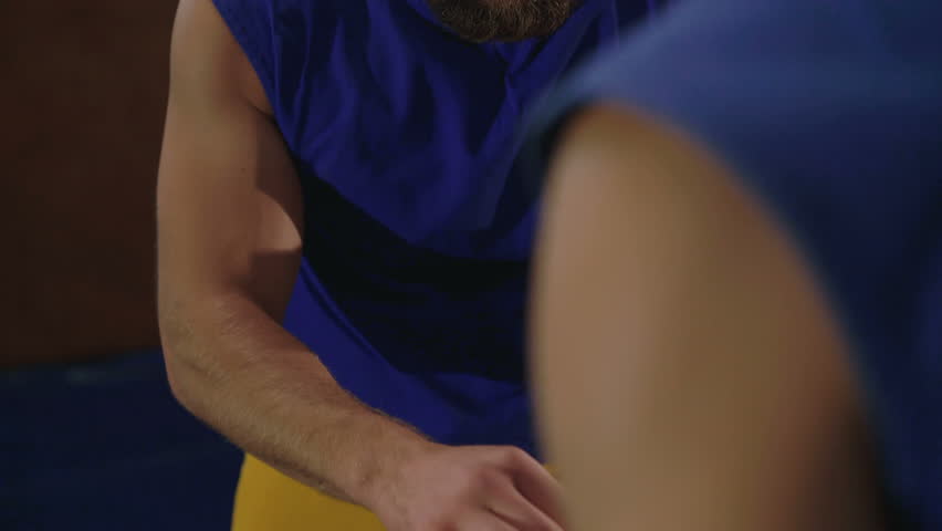Free fighters in uniform workout in the gym in 4K
