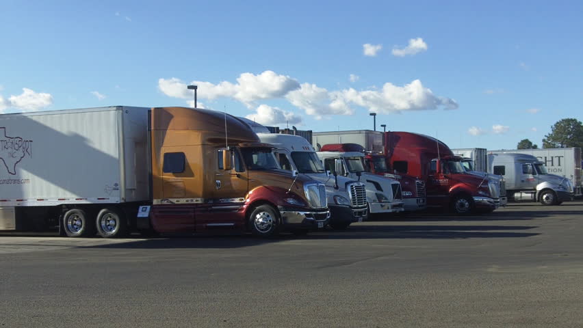 FLAGSTAFF, AZ - September 22, 2012: A group of semi trucks parked at a truck