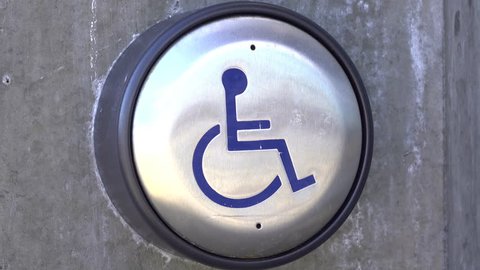 Pressing automated handicap door entrance button 4k