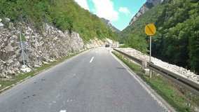 Hyper lapse of a point of view video of a motorcycle riding along the valley of the Vrbas river between Banja Luka and Jajce in Bosnia and Herzegovina in the Balkans on a sunny summer day. 