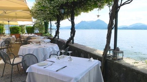 Restaurant terrace, lake Maggiore. Scenic view from cafe, Italy.