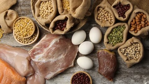 Various of protein foods on kitchen table