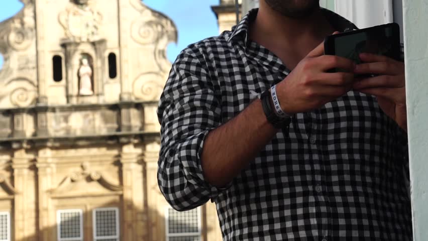 Man taking a selfie at Pelourinho, Salvador, Brazil