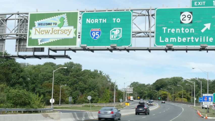 Welcome to New Jersey Sign on Interstate 95 Near Trenton at Pennsylvania New Jersey Border Royalty-Free Stock Footage #31294063
