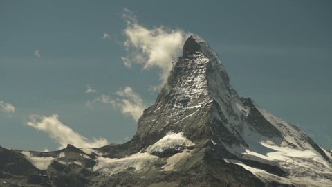 Time lapse clouds move above Swiss iconic mountain Matterhorn near lake Stellisee in Switzerland Zermatt Alps 