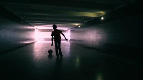 The Boy In The Underground Passage Plays With A Soccerball